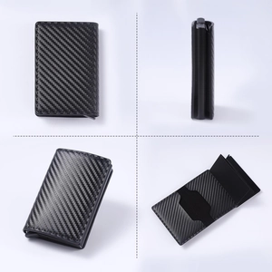 Detail view of ultra-thin RFID carbon fiber card holder showing multi-card slots and texture