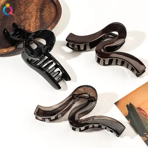 Three sleek S-shaped large hair claws in black, coffee, and translucent grey colors