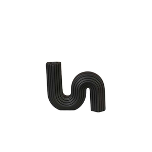 Modern black ribbed ceramic S-shaped decorative vase with unique geometric art design