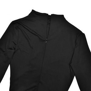 Detail view of the hidden back zipper on a sleek black evening dress for women