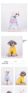 Detail view of light blue and yellow knit pet pajamas for small dogs with soft textures