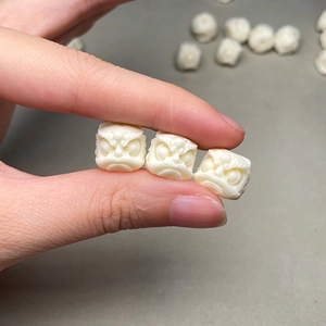 Ivory nut carved lion head beads for DIY jewelry making and bracelet accessories