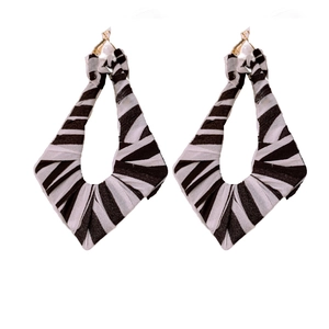 Modern geometric rhombus earrings with black and white striped fabric wrap finish