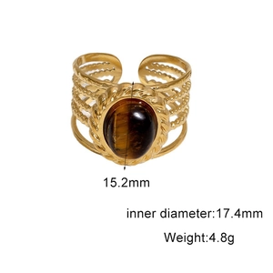 Detail view of 18k gold plated stainless steel ring with oval tiger eye stone inlay