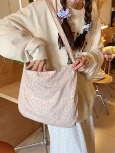 Floral canvas tote bag for women featuring a pink flower print in a spacious design