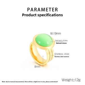 Macro detail of 18K gold stainless steel ring with green natural stone and crystal setting