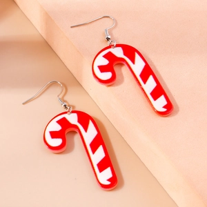 Detailed view of festive red and white striped candy cane drop earrings with silver hooks