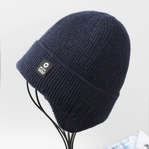 Navy blue winter beanie for men with thick knit texture and fleece lining for warmth