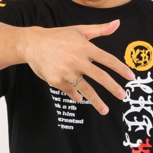 Brushed stainless steel band ring for men shown on finger for realistic scale and fit
