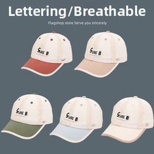 Detailed view of breathable mesh baseball caps with SURE label in five assorted colors