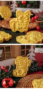 Macro view of Corgi Christmas cookies shaped as a dog in a stocking on festive background