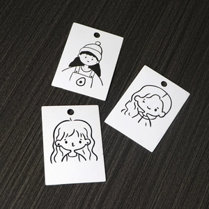 Minimalist white metal earring display cards with cute black line art cartoon girls