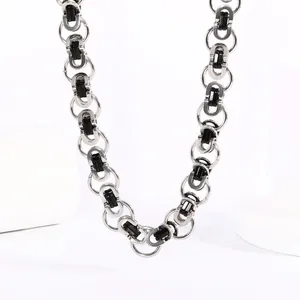 Industrial silver stainless steel chain necklace with interlocking black rectangular inserts