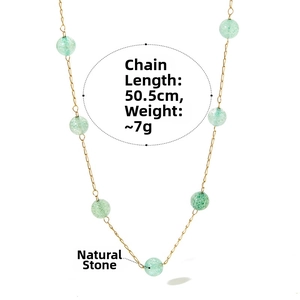 Detail showing 50.5cm gold necklace with green natural stones and 7g weight scale