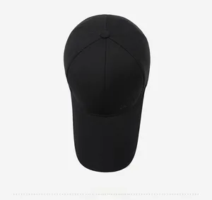 Detailed top view of a black baseball cap with embroidered Sport logo and long brim