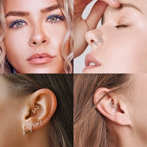 Detail shots showing crescent moon septum and daith rings with inlaid zircon gems