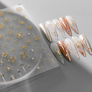 Gouden en witte luxe nagelstickers met sterren en metalen gegraveerde patronen TL007