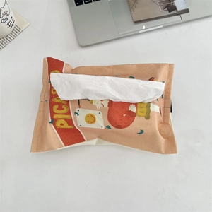 Detail of PICA cartoon tissue bag in warm pink cotton linen fabric on white table