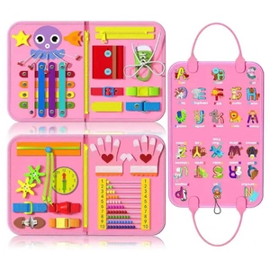 Pink felt busy board for kids featuring alphabet, clock, and sensory motor skill tasks