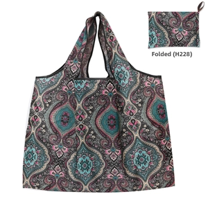 Detail view of Paisley pattern foldable shopping bag with compact storage size