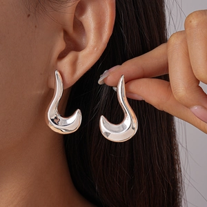Minimalist silver irregular geometric stud earrings with polished liquid metal finish