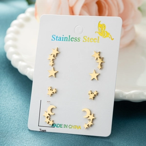 Golden stainless steel star and moon stud earring set shown with 7mm and 12mm dimensions