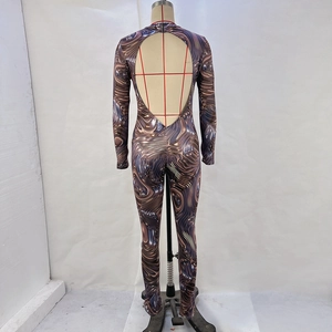 Detailed backless view of long sleeve jumpsuit featuring blue marble fluid art print