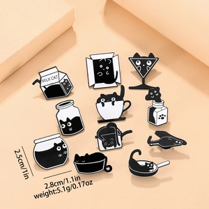 Set of 10 enamel pins showing funny black cats in milk boxes and jars with measurements