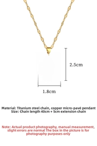 Macro detail of camellia pendant necklace with micro-pave crystals and golden titanium chain
