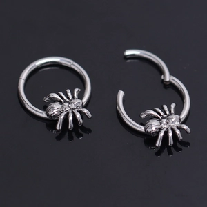 Pair of silver stainless steel hoop earrings with 3D spider charms and clicker closure