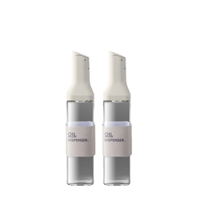 Set of two minimalist glass oil and vinegar dispensers with leak-proof white caps