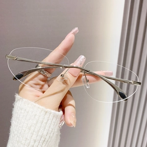 Détails de lunettes de soleil ovales sans monture en métal argenté de style Y2K