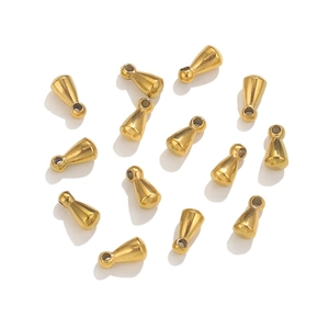 Macro view of gold-plated stainless steel teardrop pendants for DIY jewelry making