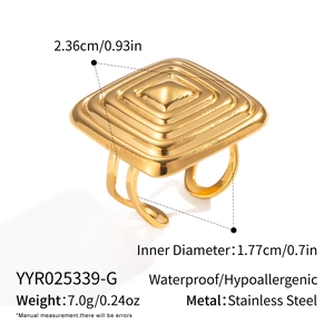 Macro shot of gold square stainless steel ring with dimensions and technical specs