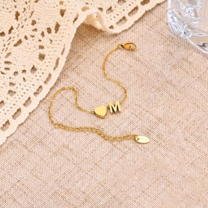 Polished K18 gold-plated heart and 'M' letter pendant charm bracelet for women