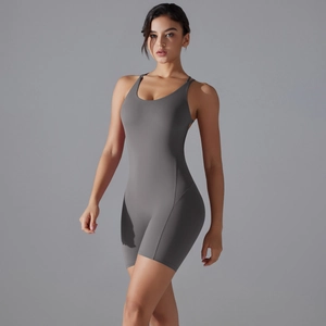 Close-up of seamless gray yoga bodysuit with thin straps and open back for gym