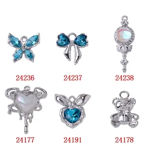 Blue heart and butterfly charms set for DIY jewelry making in silver alloy finish