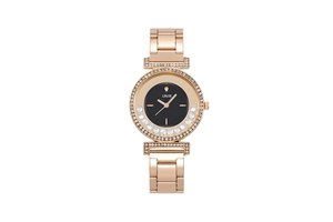 Detailed shot of rose gold fashion watch with crystal bezel and floating diamonds on black dial