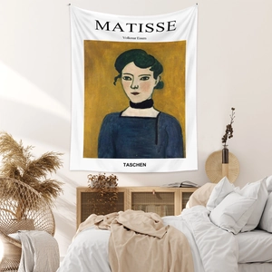 Detailed texture of Matisse portrait tapestry hanging in a cozy bedroom with soft shadows