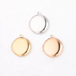 Three polished stainless steel round locket pendants in silver gold and rose gold colors
