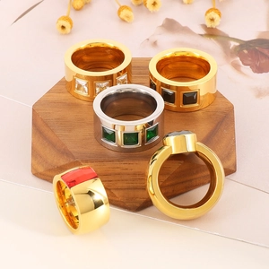 Luxury titanium steel wide ring set with colorful zircon on a wooden display stand