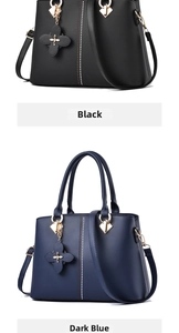 Detail view of black and navy blue PU leather handbags with clover charm and beaded lines