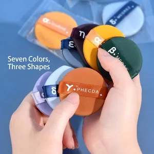 Set of seven colorful Big Dipper makeup air cushion puffs with labeled silk ribbons