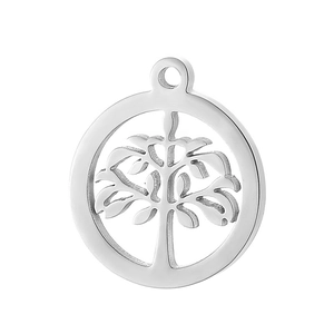 Macro shot of silver stainless steel tree of life hollow round pendant on white background