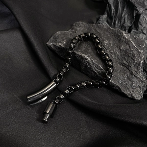 Minimalist black stainless steel chain bracelet for men with industrial hook on black stone