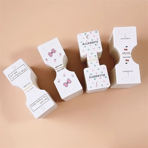 Foldable paper tags for hair accessories with handmade designs and patterns