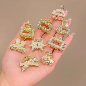 Exquisite gold alloy hair claws with pearls and rhinestones in butterfly and star shapes