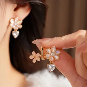 Exquisite floral heart drop earrings with pink resin petals and zircon stones