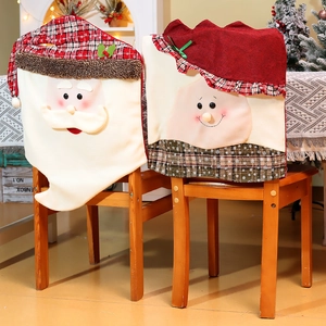 Christmas dining chair covers featuring Santa Claus and cartoon characters in red plaid