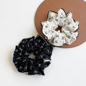 Black and white polka dot bow scrunchies set with detailed hem and soft texture